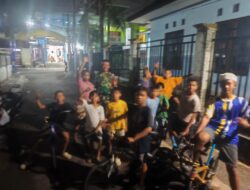 Sentuhan Humanis Babinsa Lindungi Anak dari Bahaya Balapan Sepeda